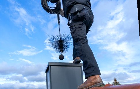 Feeding a cord through a chase ahead of a liner run